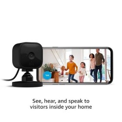 Compact indoor plug-in smart security camera, 1080p HD video, night vision, motion detection, two-way audio, easy set up